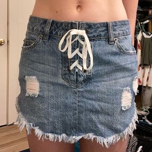 Rip Curl lace up distressed denim skirt